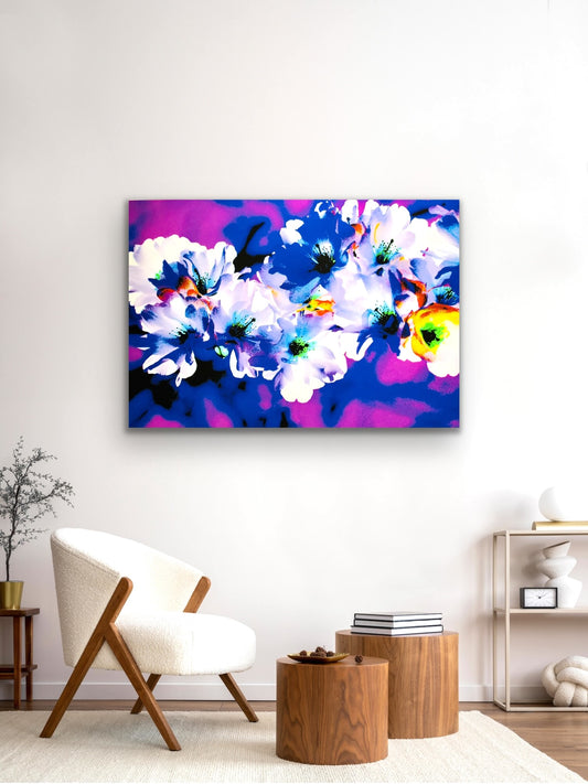 FLOWERS of 68 – Multi Colors – limited edition fine art print by Swedish contemporary artist Ewa Borin displayed as contemporary wall art in a bright Scandinavian-inspired interior with a white armchair and natural wood furniture, inspired by the blooming cherry trees in Kungsträdgården, Stockholm
